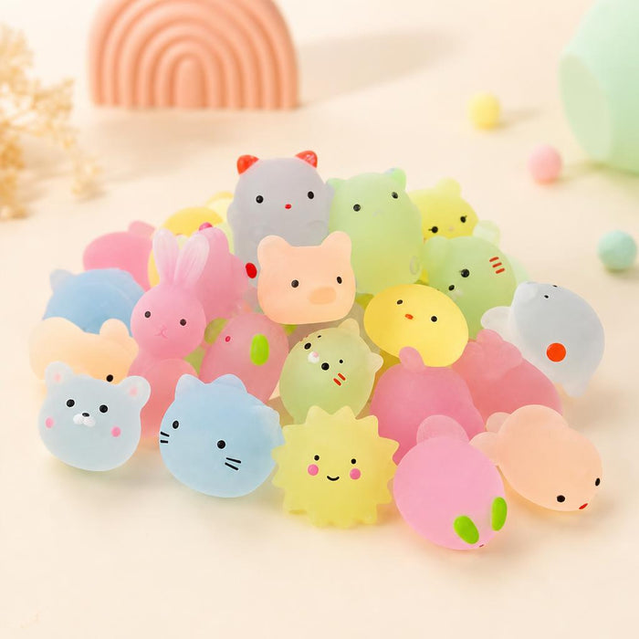 Animalitos mochi que brillan en la oscuridad – foto de estudio